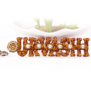 Urvashi Golden Bronze Pearl Name Keychain